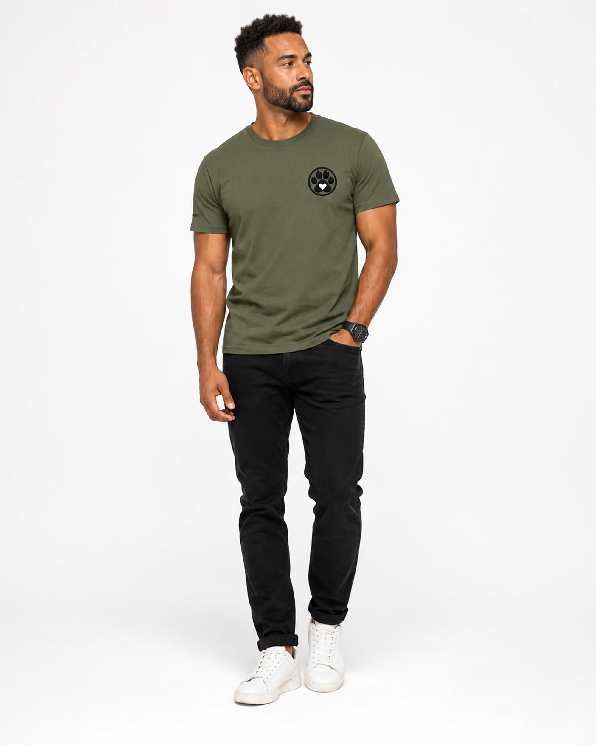 Adult man wearing a Calm Warrior T-shirt in a clean studio setting